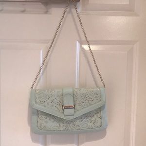 Aldo Mint green clutch. Colorful lining.
